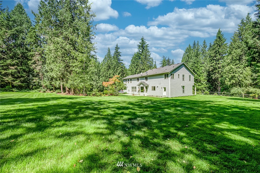 16108 OK Mill Road Snohomish, WA 98290 - Photo 21 of 23 a view of a house with a yard