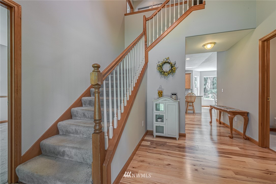 16108 OK Mill Road Snohomish, WA 98290 - Photo 4 of 23 a view of entryway and hall with wooden floor