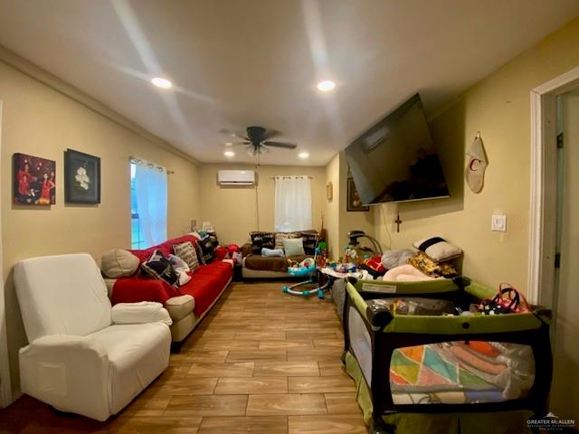 5910 Alpine Avenue Mission, TX 78574 - Photo 5 of 15 a living room with furniture a flat screen tv and a couch