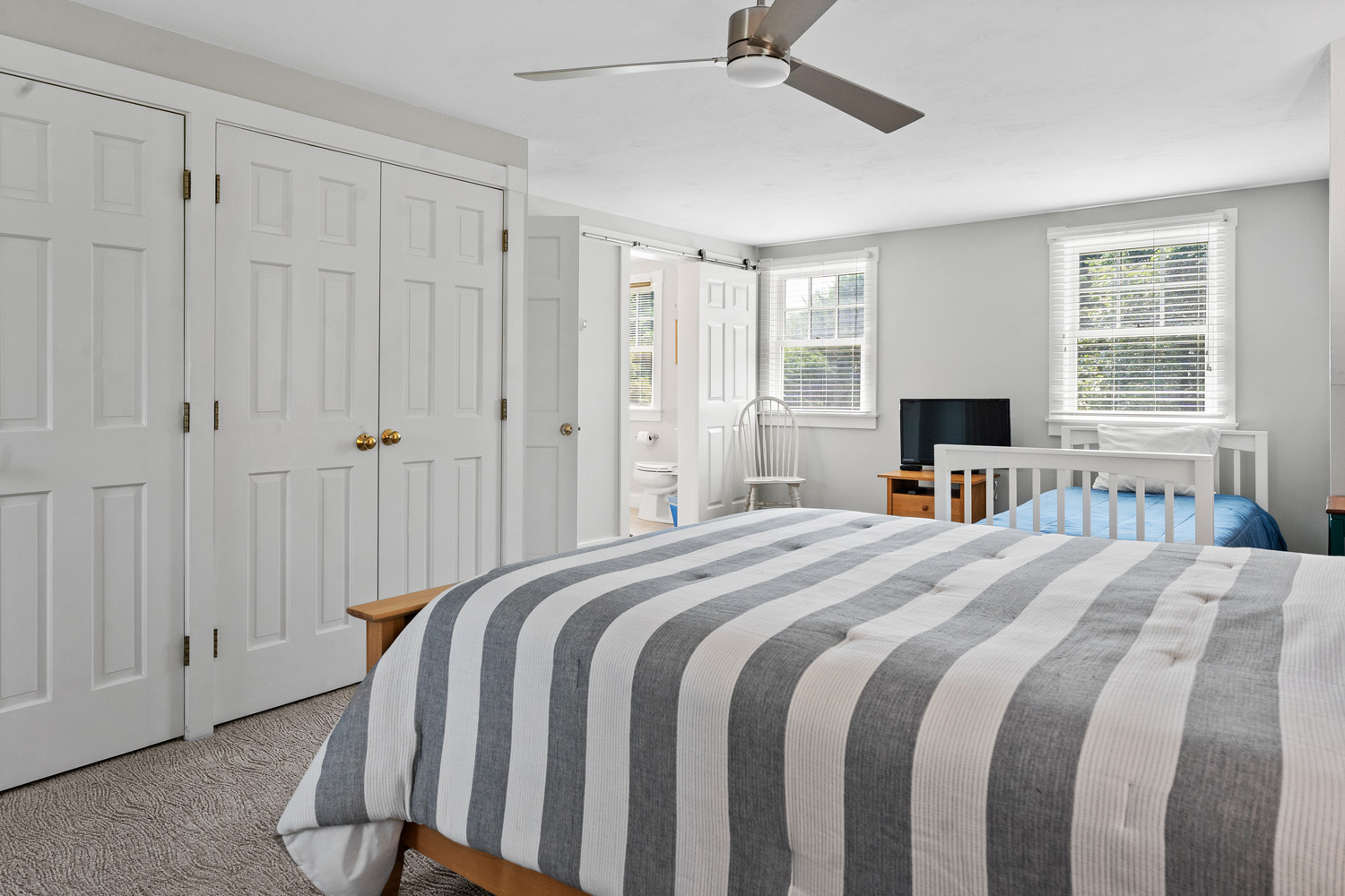 5 Katama Drive Edgartown, MA 02539 - Photo 21 of 28 a bedroom with a bed and a window