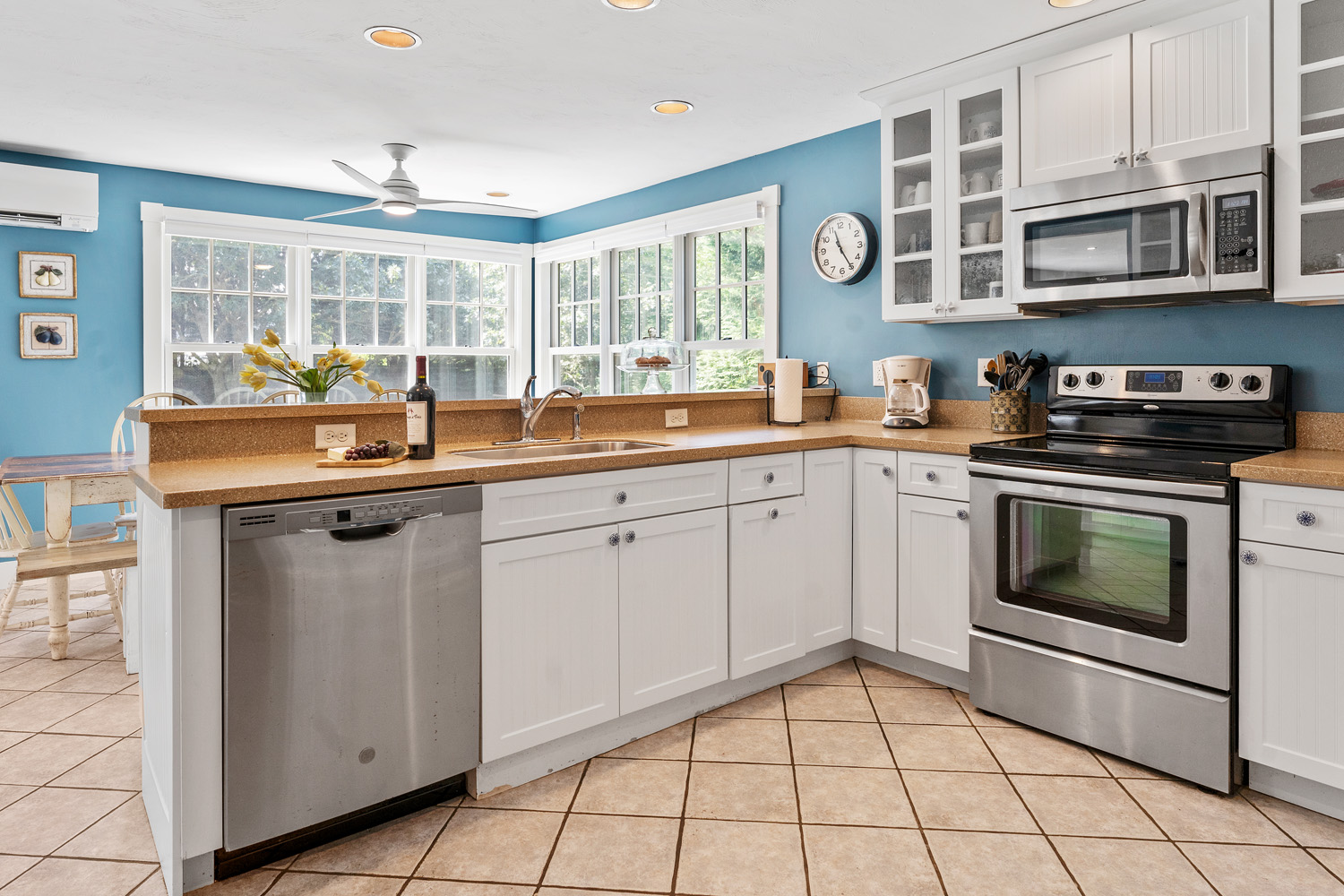 5 Katama Drive Edgartown, MA 02539 - Photo 6 of 28 a kitchen with stainless steel appliances granite countertop a stove a sink and a microwave