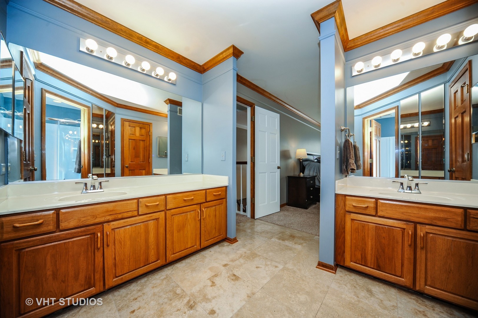 630 Raintree Road Buffalo Grove, IL 60089 - Photo 12 of 26 a spacious bathroom with a granite countertop sink mirror and bathtub