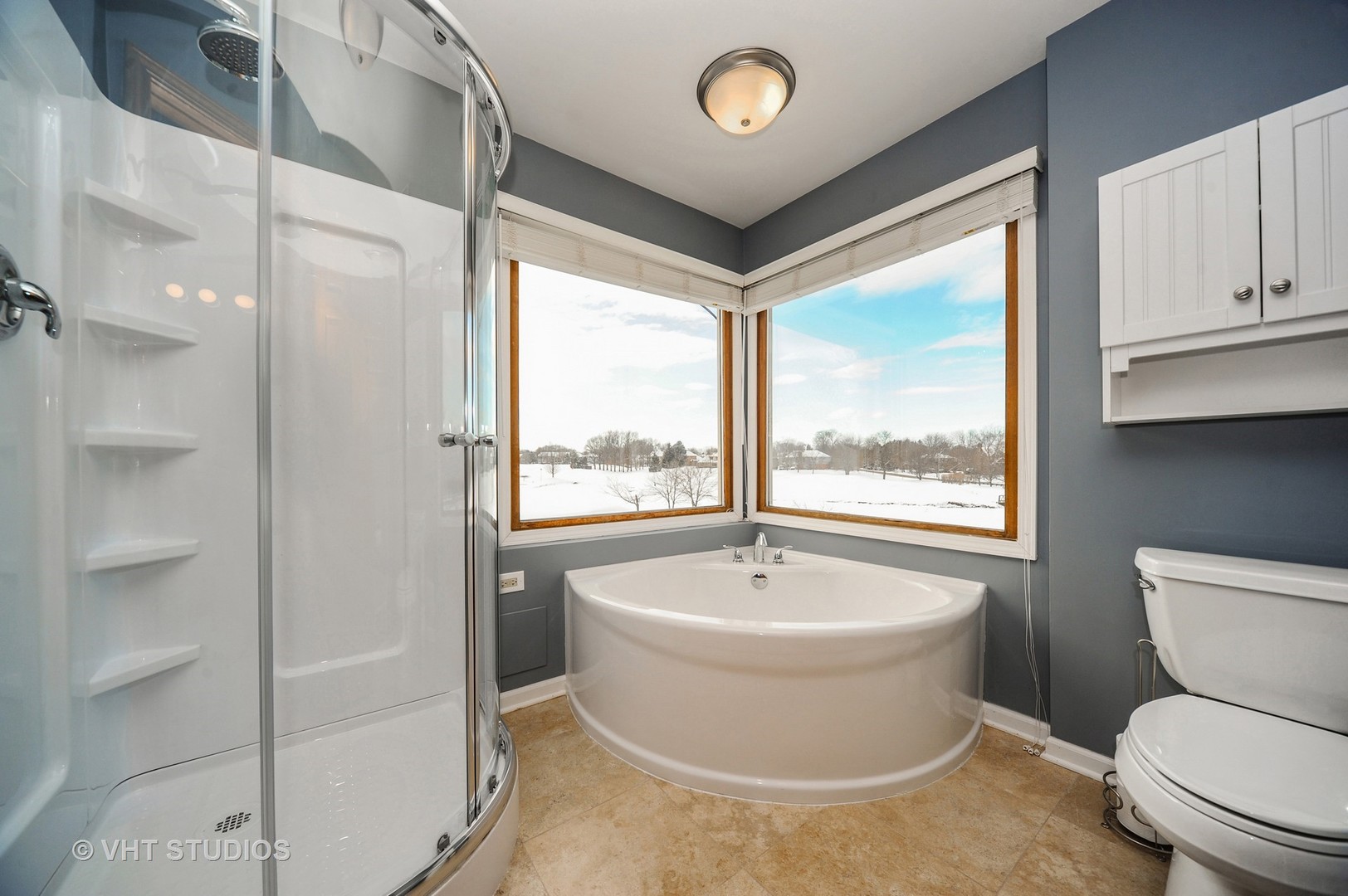 630 Raintree Road Buffalo Grove, IL 60089 - Photo 13 of 26 a white toilet sitting next to a bathroom next to a window