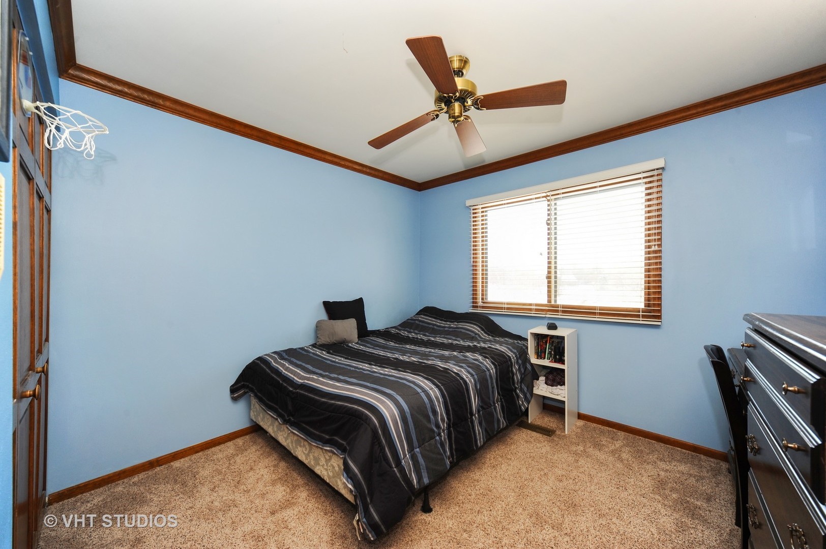 630 Raintree Road Buffalo Grove, IL 60089 - Photo 15 of 26 a bedroom with a bed and a window