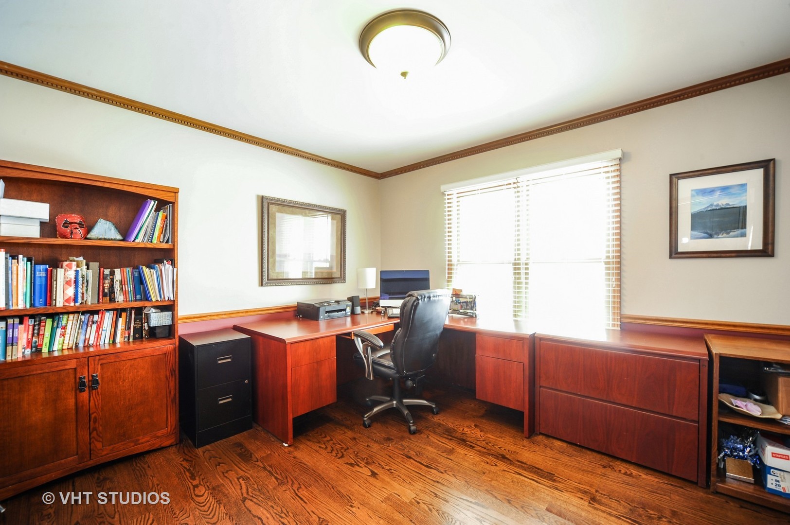 630 Raintree Road Buffalo Grove, IL 60089 - Photo 17 of 26 a view of a workspace with furniture and a window
