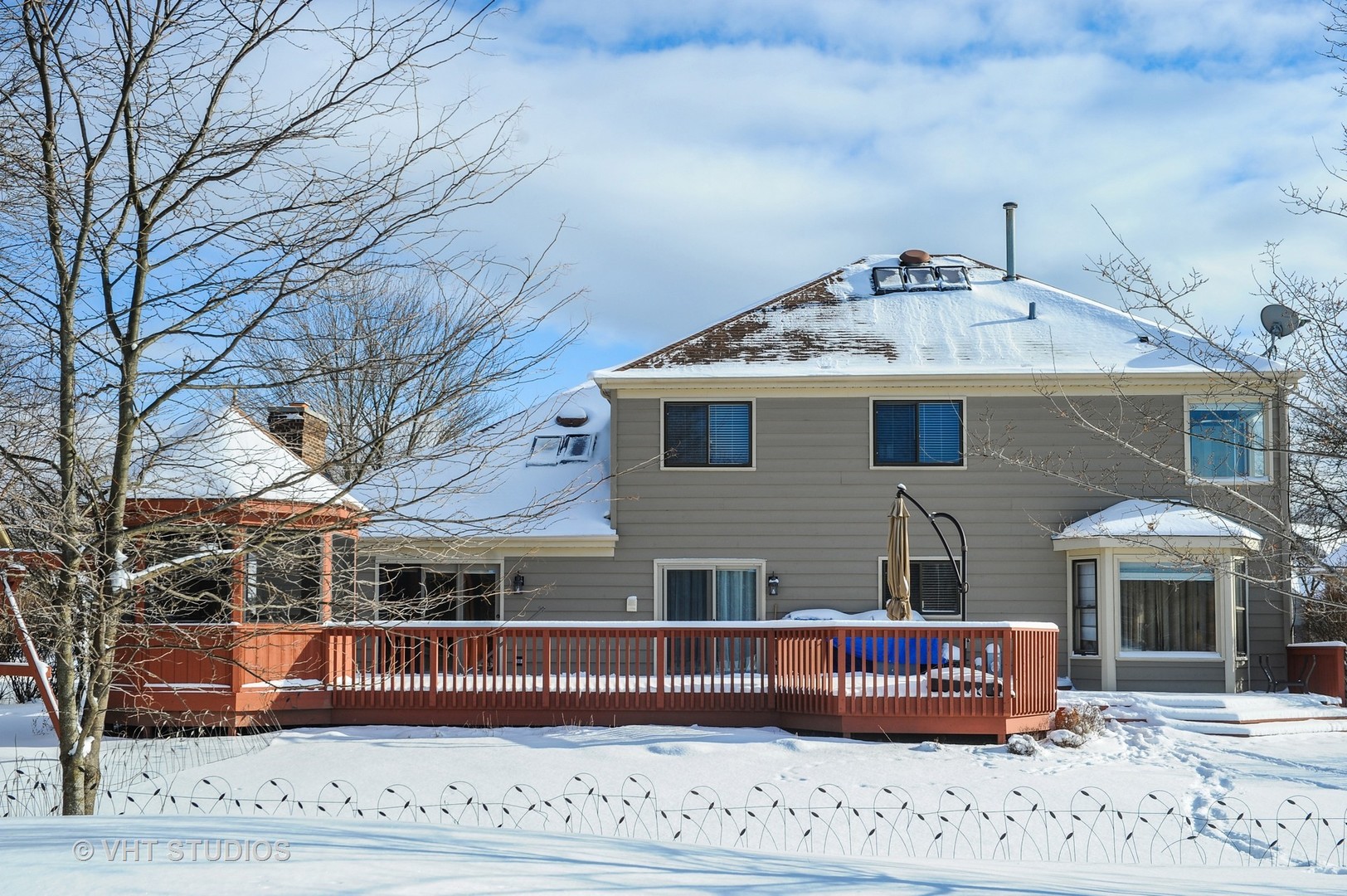 630 Raintree Road Buffalo Grove, IL 60089 - Photo 23 of 26 a view of a house with a yard
