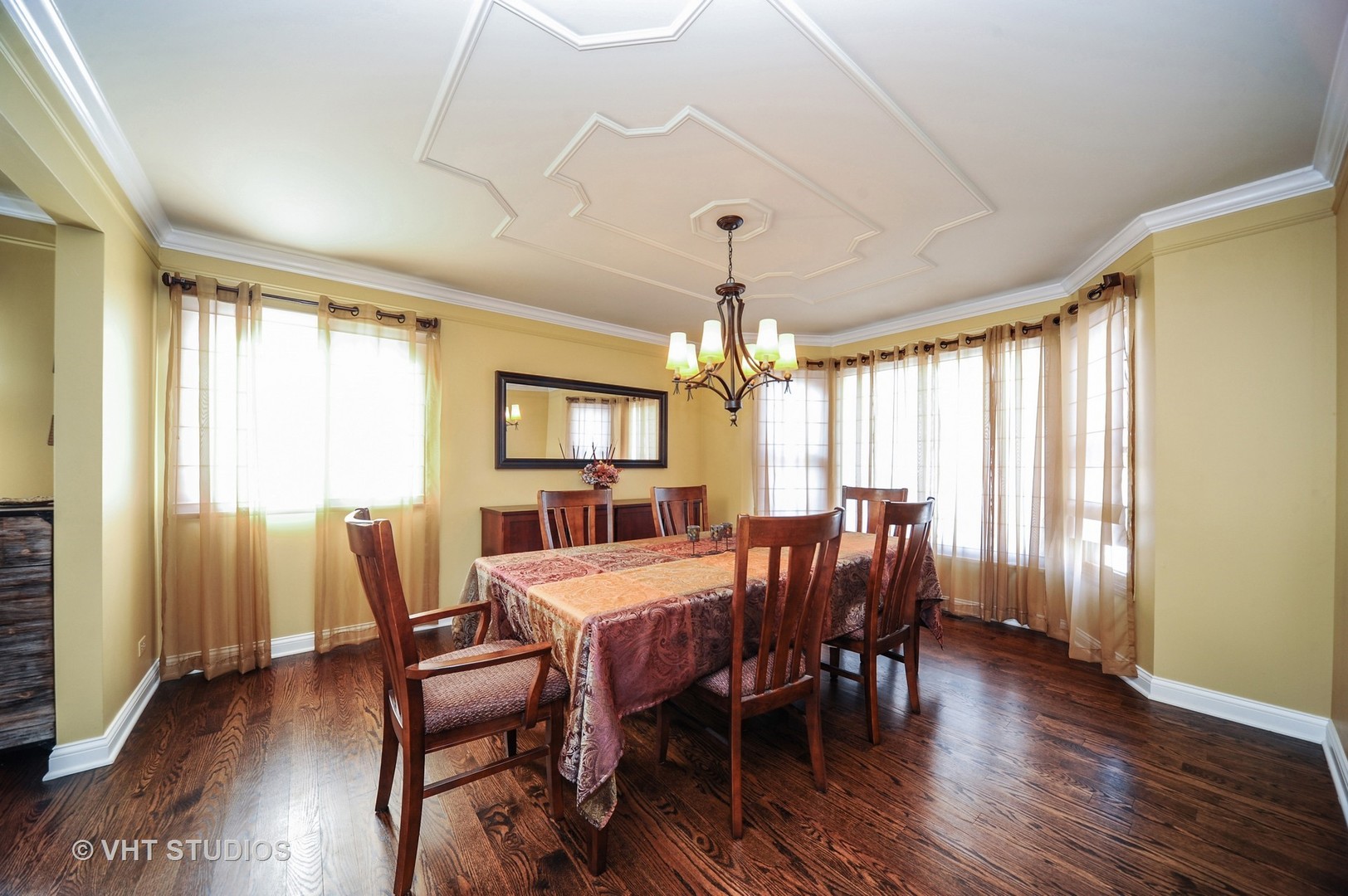 630 Raintree Road Buffalo Grove, IL 60089 - Photo 10 of 26 a view of a dining room with furniture window and wooden floor