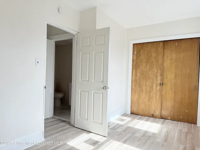 a view of a bathroom with a door