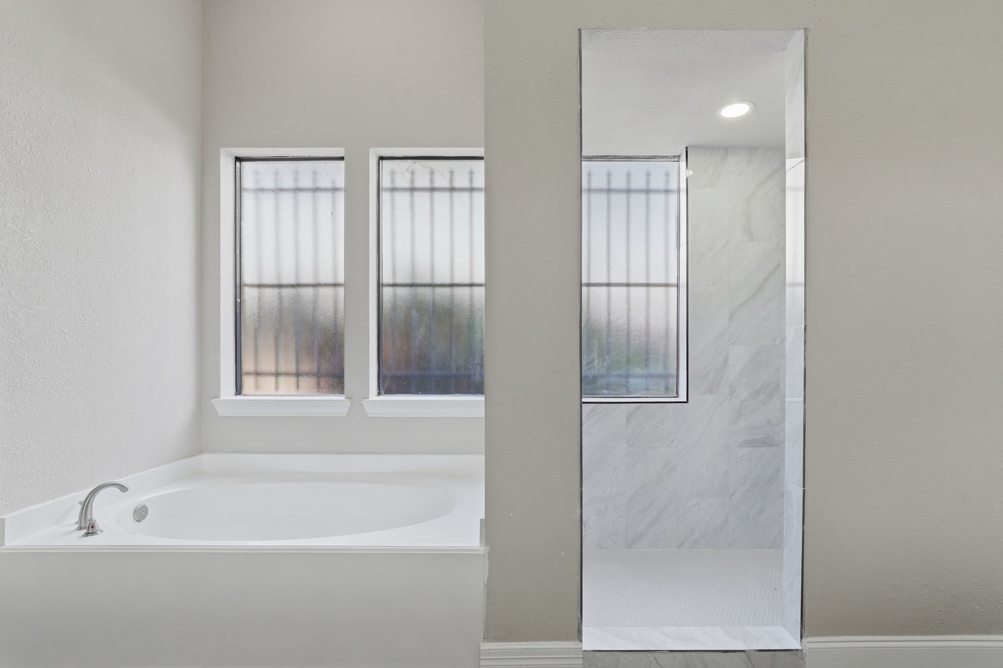 7611 Naremore Drive Spring, TX 77379 - Photo 23 of 48 Soaker Tub and entrance to your shower!