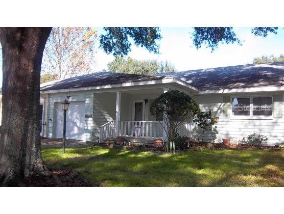 8655 Southwest 95 Street Ocala, FL 34481 - Photo 1 of 1 a view of a house with a backyard