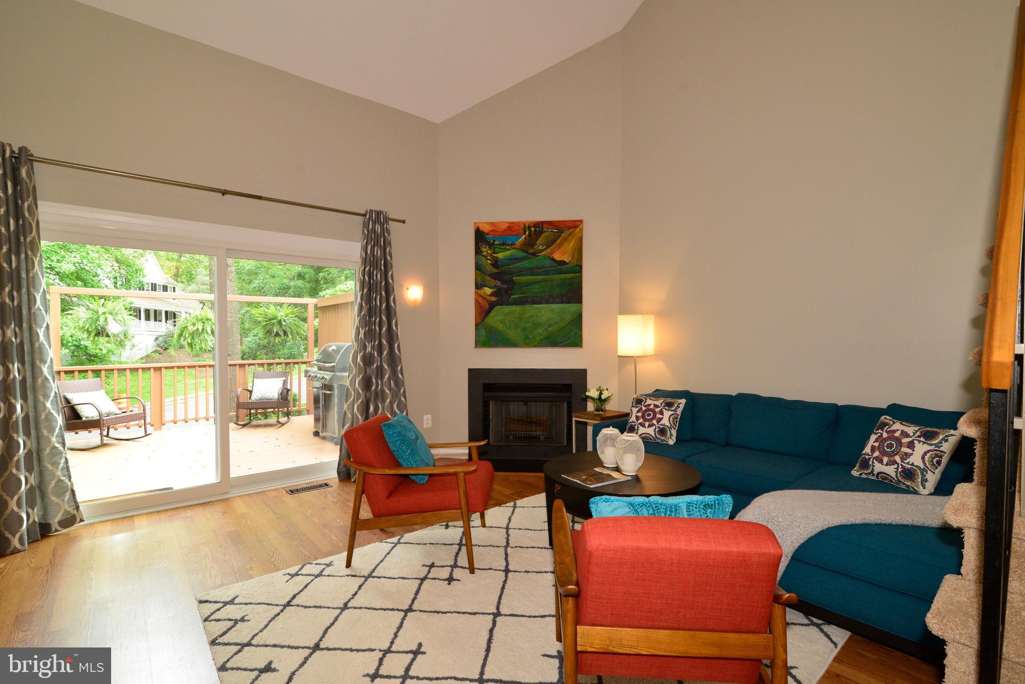 11609 Chapel Cross Way Reston, VA 20194 - Photo 10 of 32 Living Room with SG Doors Opening to Deck.