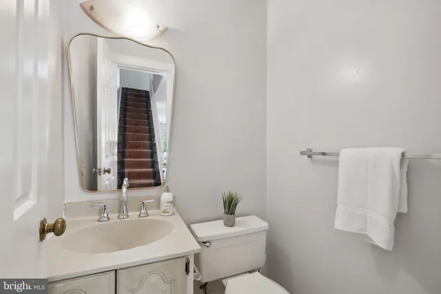 a kitchen with stainless steel appliances granite countertop a refrigerator and cabinets