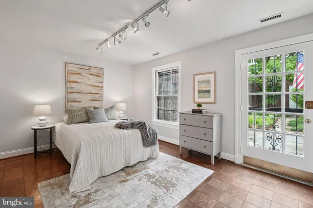 a kitchen with a stove and a refrigerator