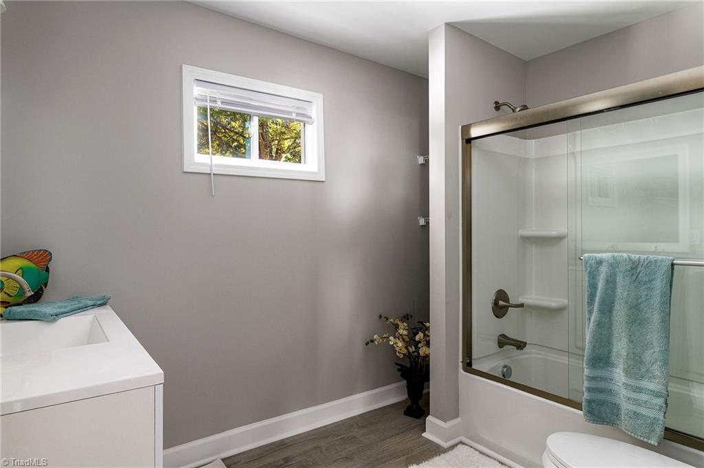 5515 Bethania Road Pfafftown, NC 27040 - Photo 34 of 49 Hall bathroom near 3 extra bedrooms