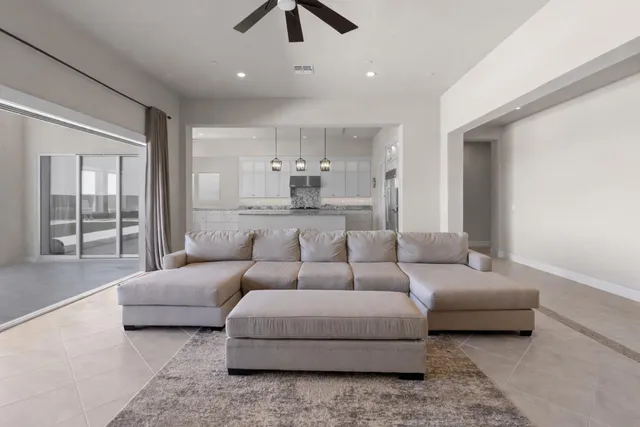 a lobby with furniture and floor to ceiling window