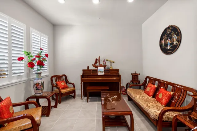 a white toilet sitting next to a bathroom sink