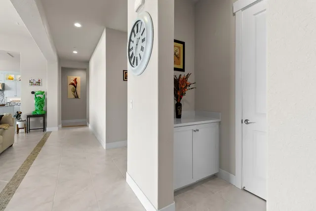 a bathroom with a toilet a sink and a mirror