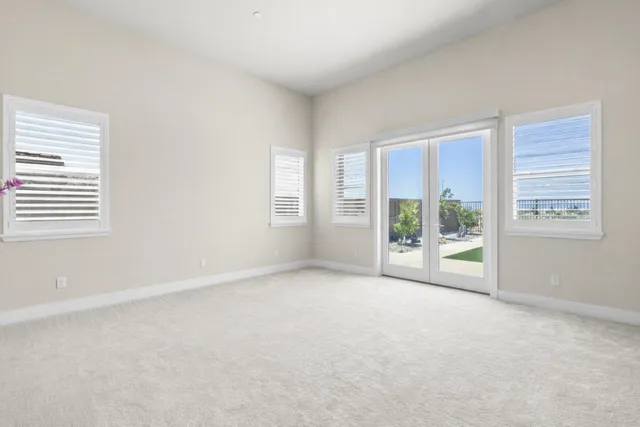 an empty room with windows