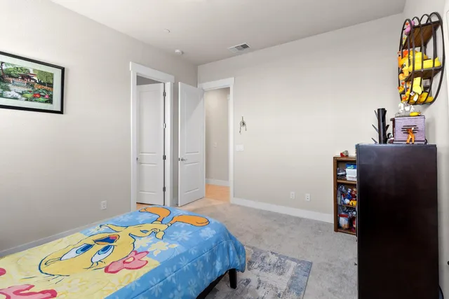 a backyard of a house with yard and outdoor seating