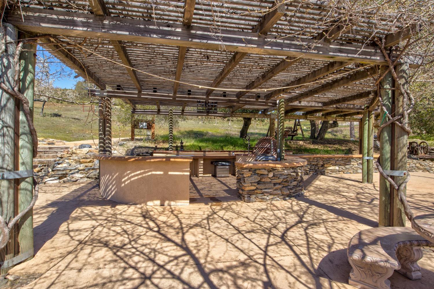 7005 Mountain Ranch Road Mountain Ranch, CA 95246 - Photo 29 of 90 a view of a yard with wooden deck
