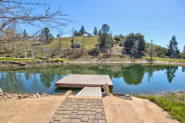 a view of backyard with green space