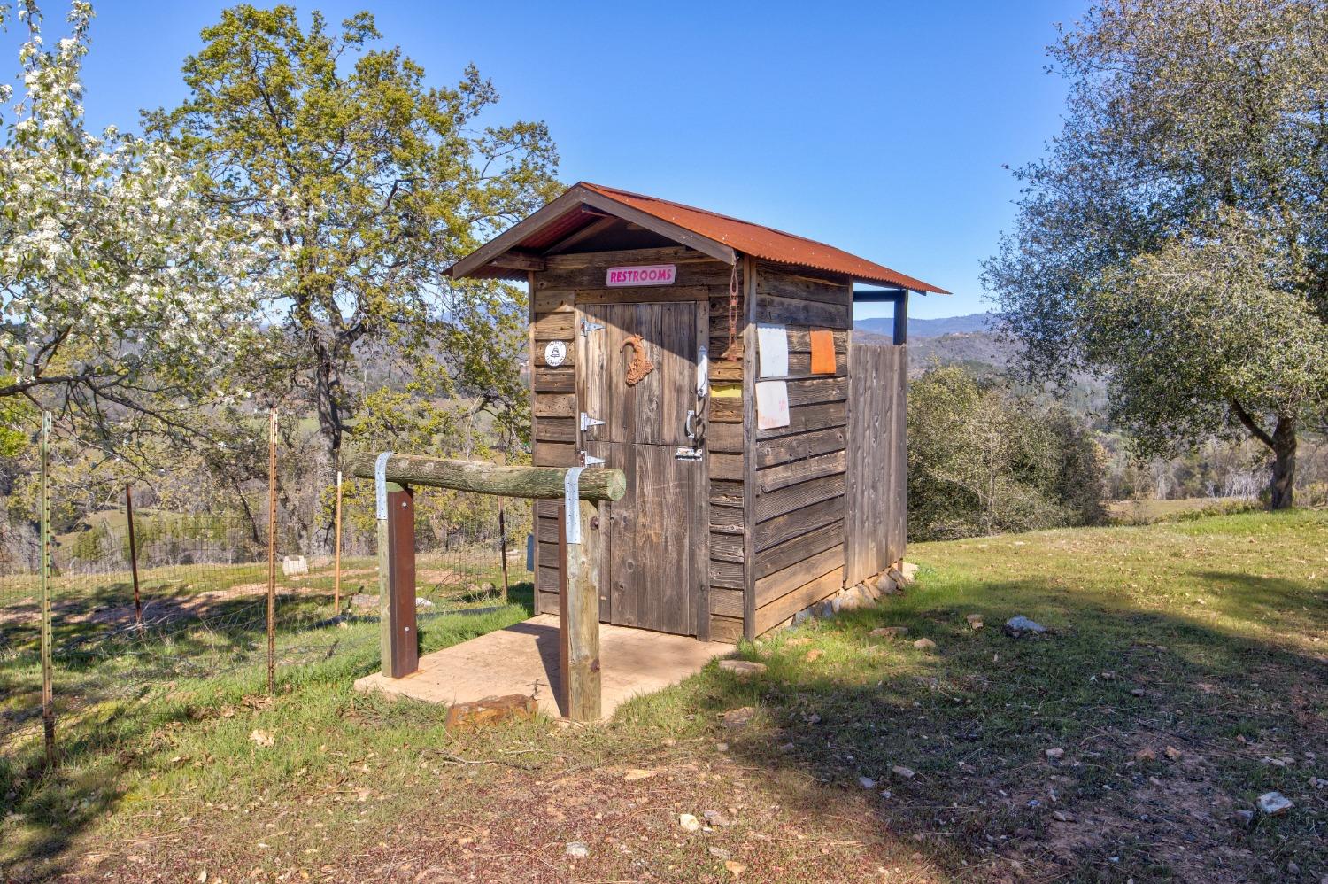 7005 Mountain Ranch Road Mountain Ranch, CA 95246 - Photo 50 of 90 a front view of a house with a yard