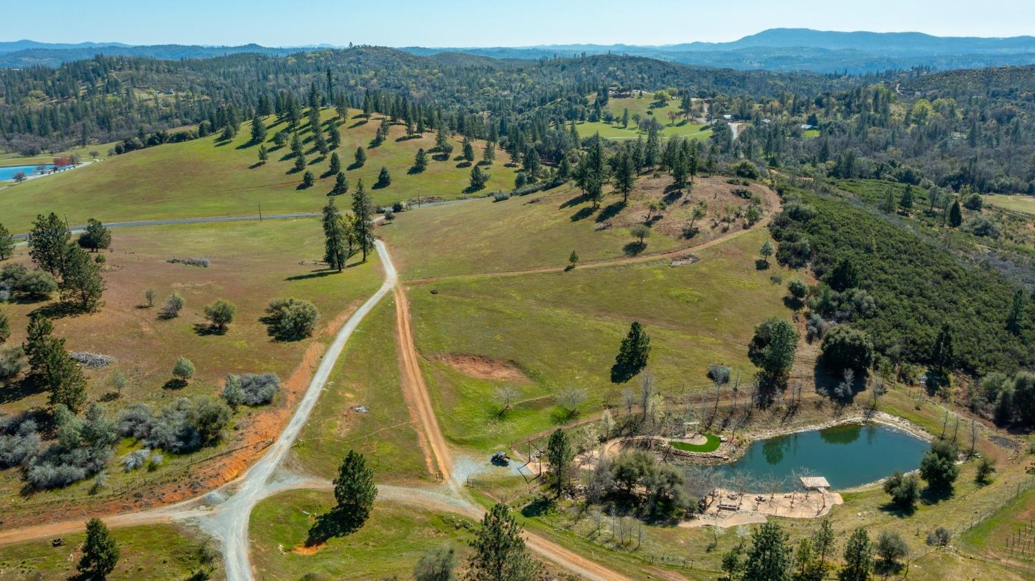 7005 Mountain Ranch Road Mountain Ranch, CA 95246 - Photo 67 of 90 an aerial view of residential houses with outdoor space
