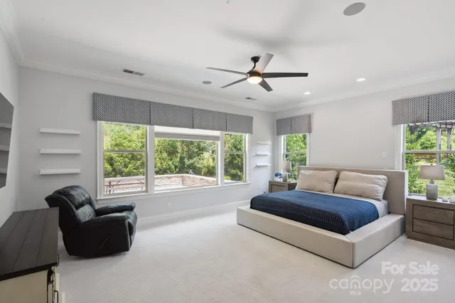 a living room with couch and a large window