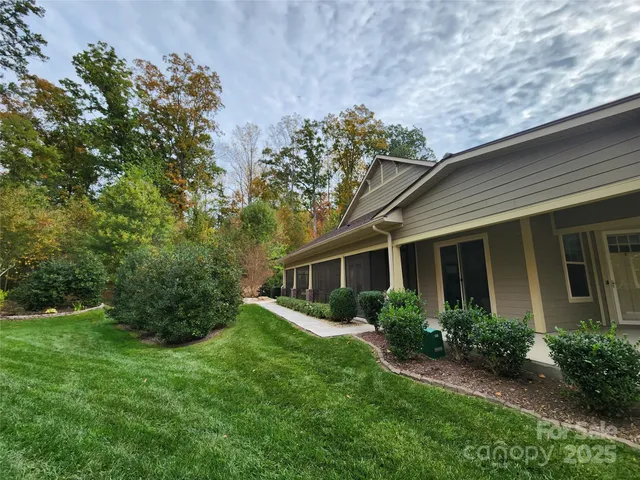 a house with a tree in front of it