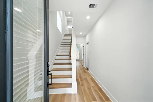 a view of entryway with wooden floor