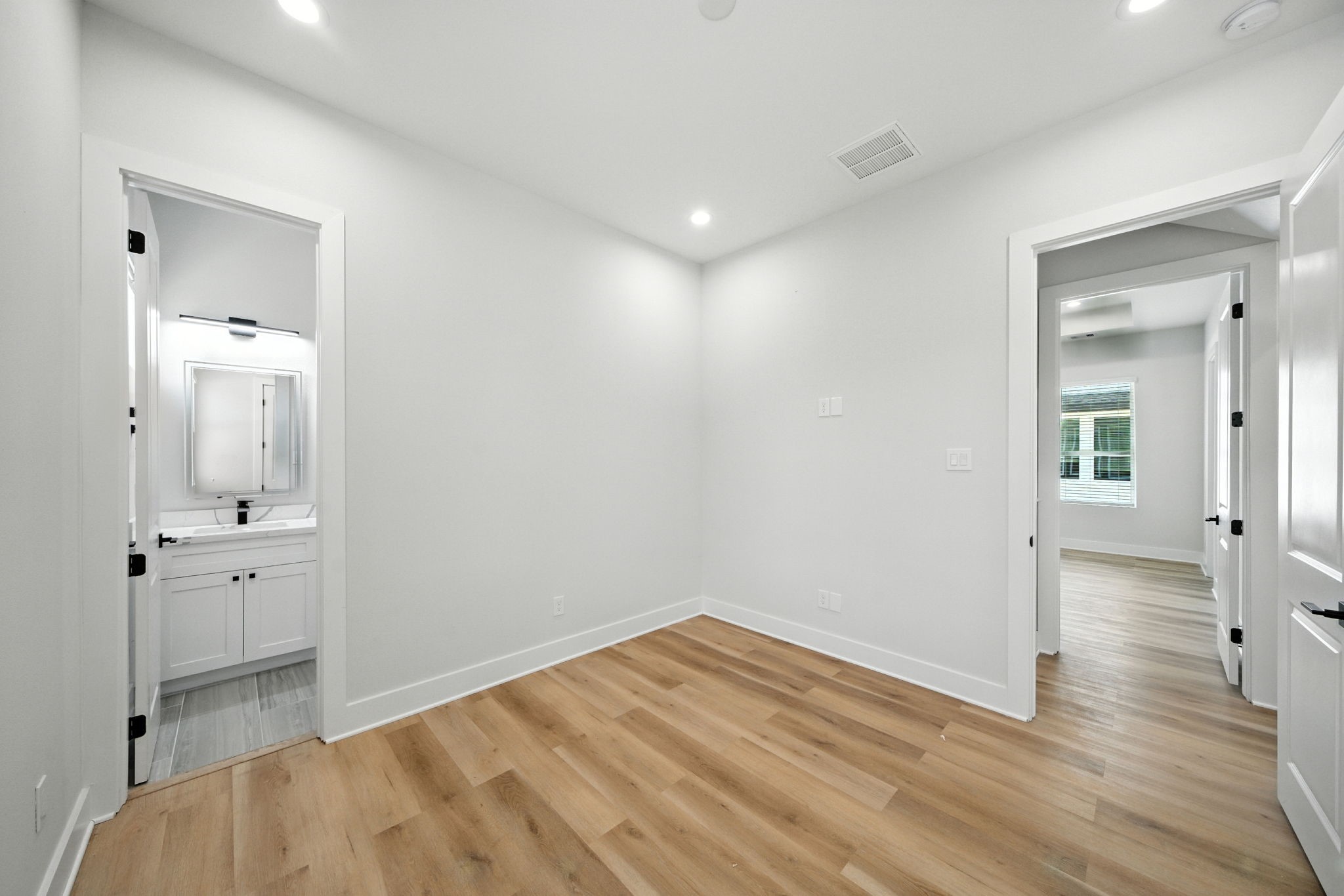 2304 Hoskins Drive, Unit D Houston, TX 77080 - Photo 33 of 41 a view of empty room with wooden floor