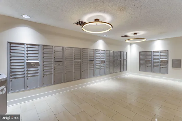 a room with lots of furniture and windows