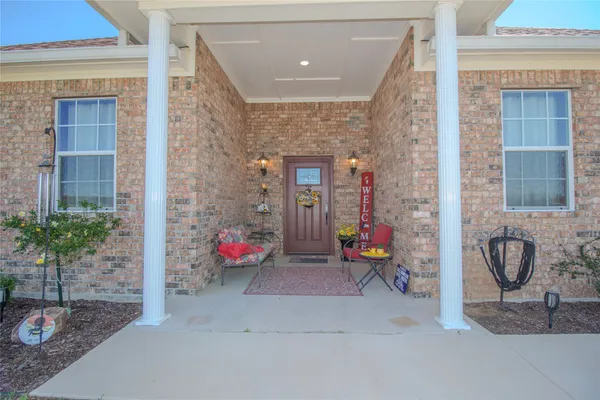 a view of outdoor space with porch and living room