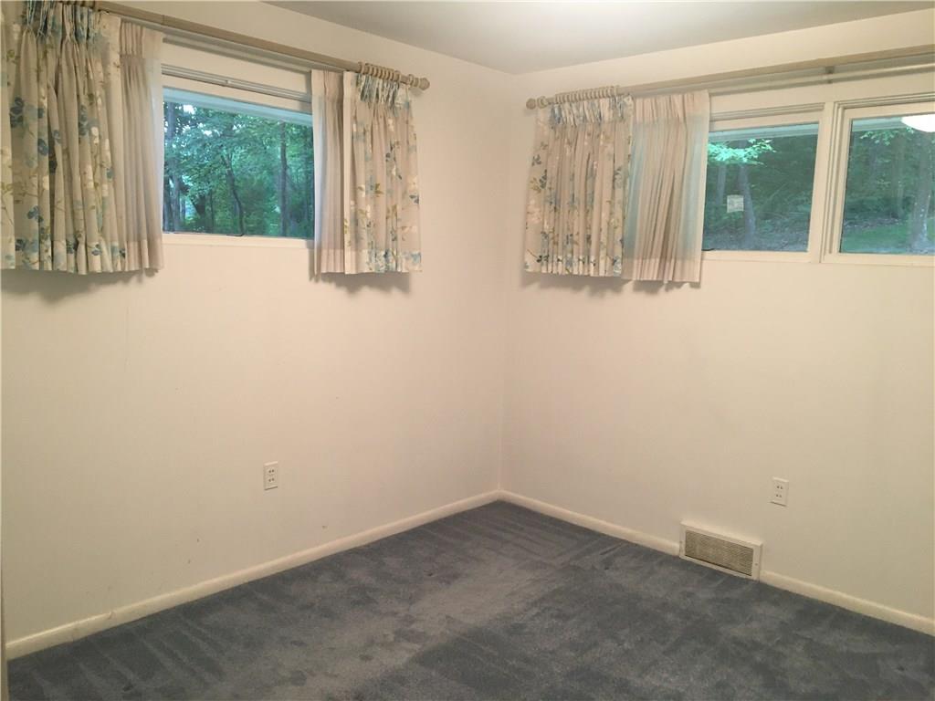 285 Oak Grove Road Industry, PA 15052 - Photo 13 of 24 Another large bedroom that overlooks the rear of the property