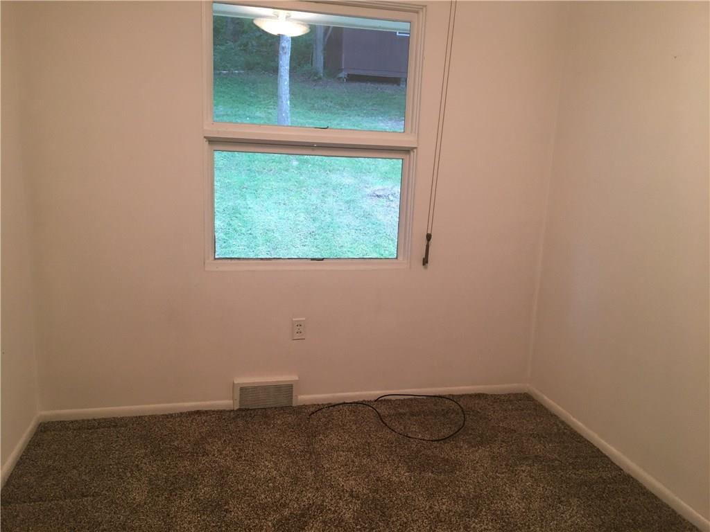 285 Oak Grove Road Industry, PA 15052 - Photo 14 of 24 The third bedroom looking over the rear yard