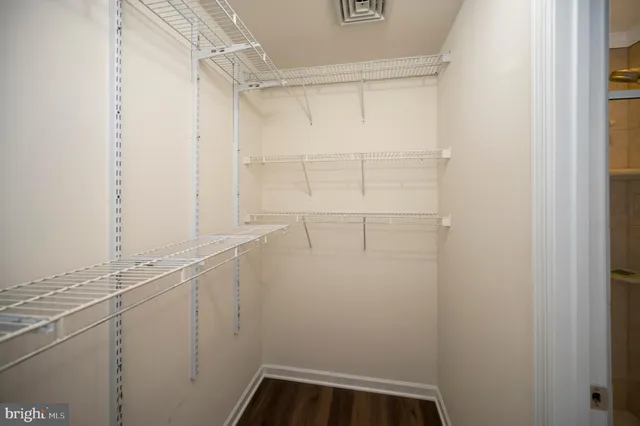 a view of a room with racks on the wall
