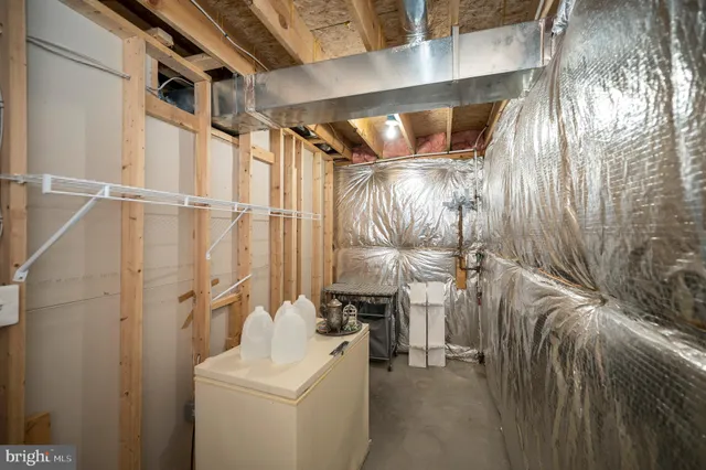 a view of an empty room and glass door