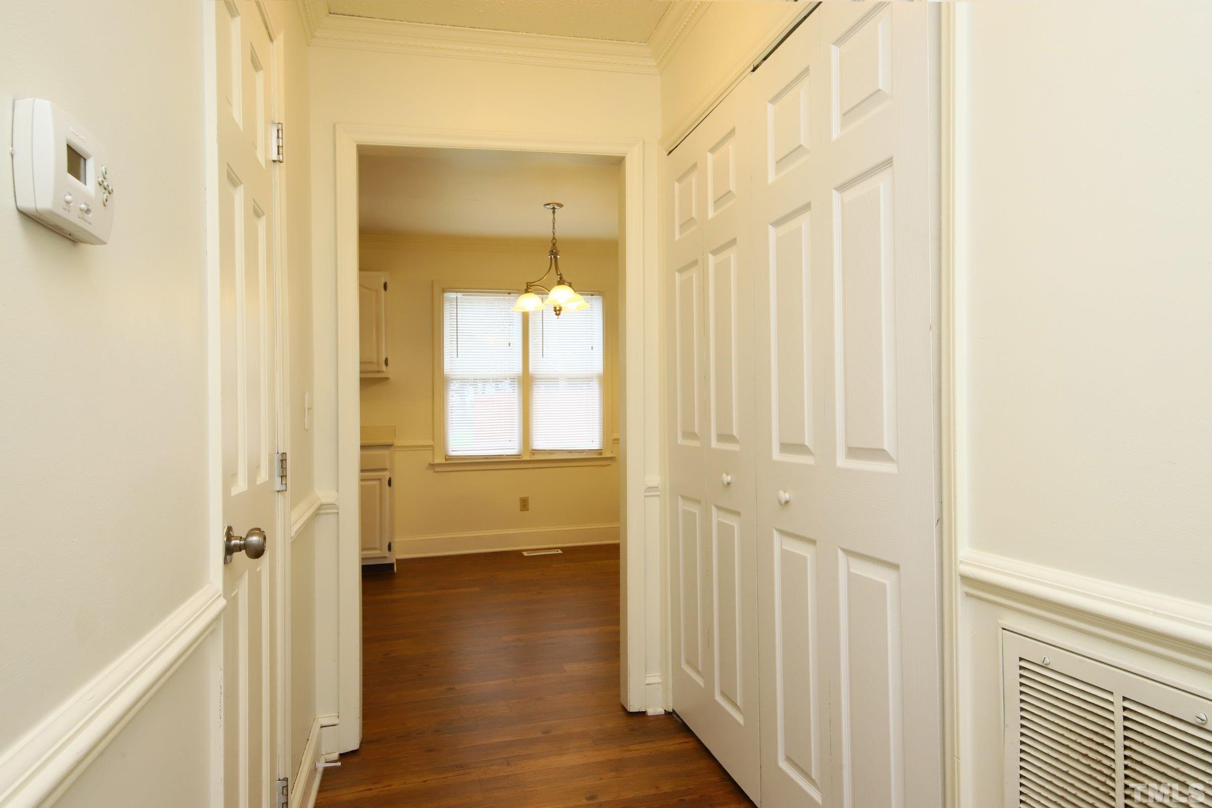 4224 Bluewing Road Raleigh, NC 27616 - Photo 15 of 29 a view of a bathroom with a tub shower and a sink