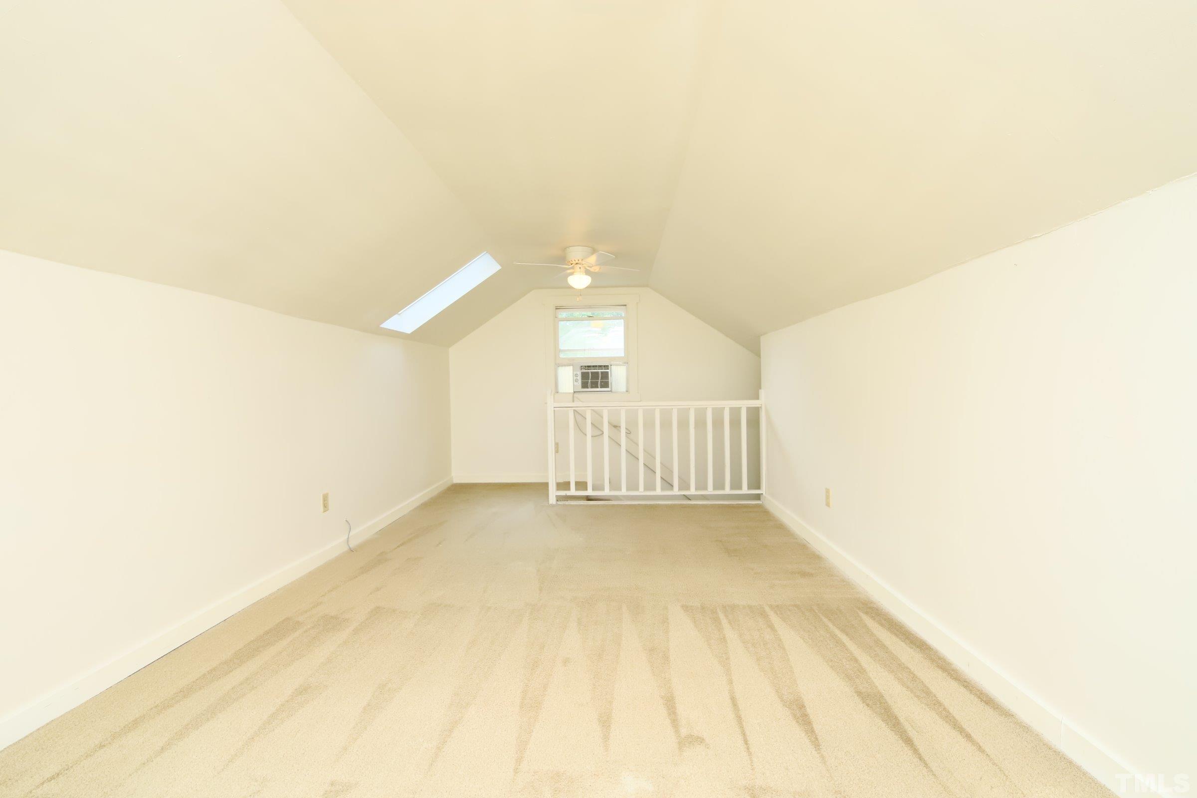 4224 Bluewing Road Raleigh, NC 27616 - Photo 24 of 29 a view of a room has wooden floor and brick walls