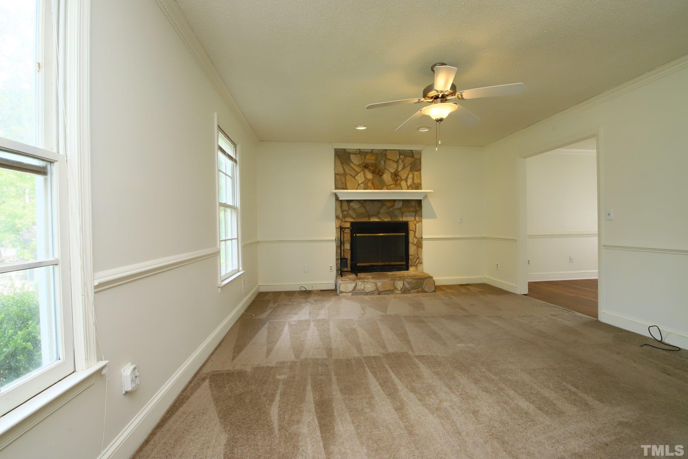 4224 Bluewing Road Raleigh, NC 27616 - Photo 5 of 29 a view of an empty room with a window