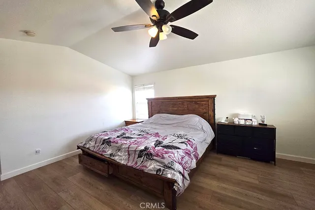 a bathroom with a sink toilet and shower curtain