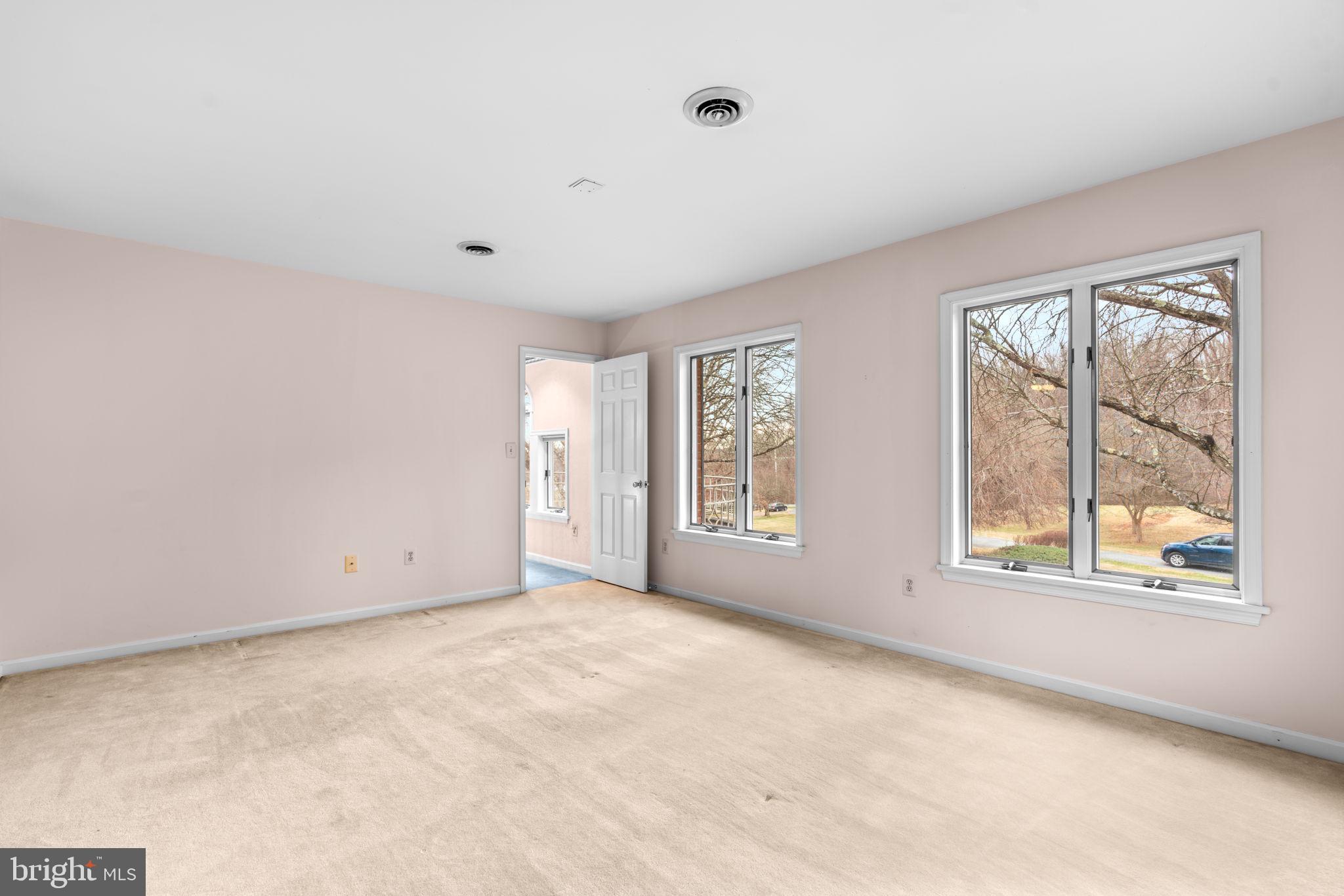 6005 Ten Oaks Road Clarksville, MD 21029 - Photo 75 of 86 an empty room with windows