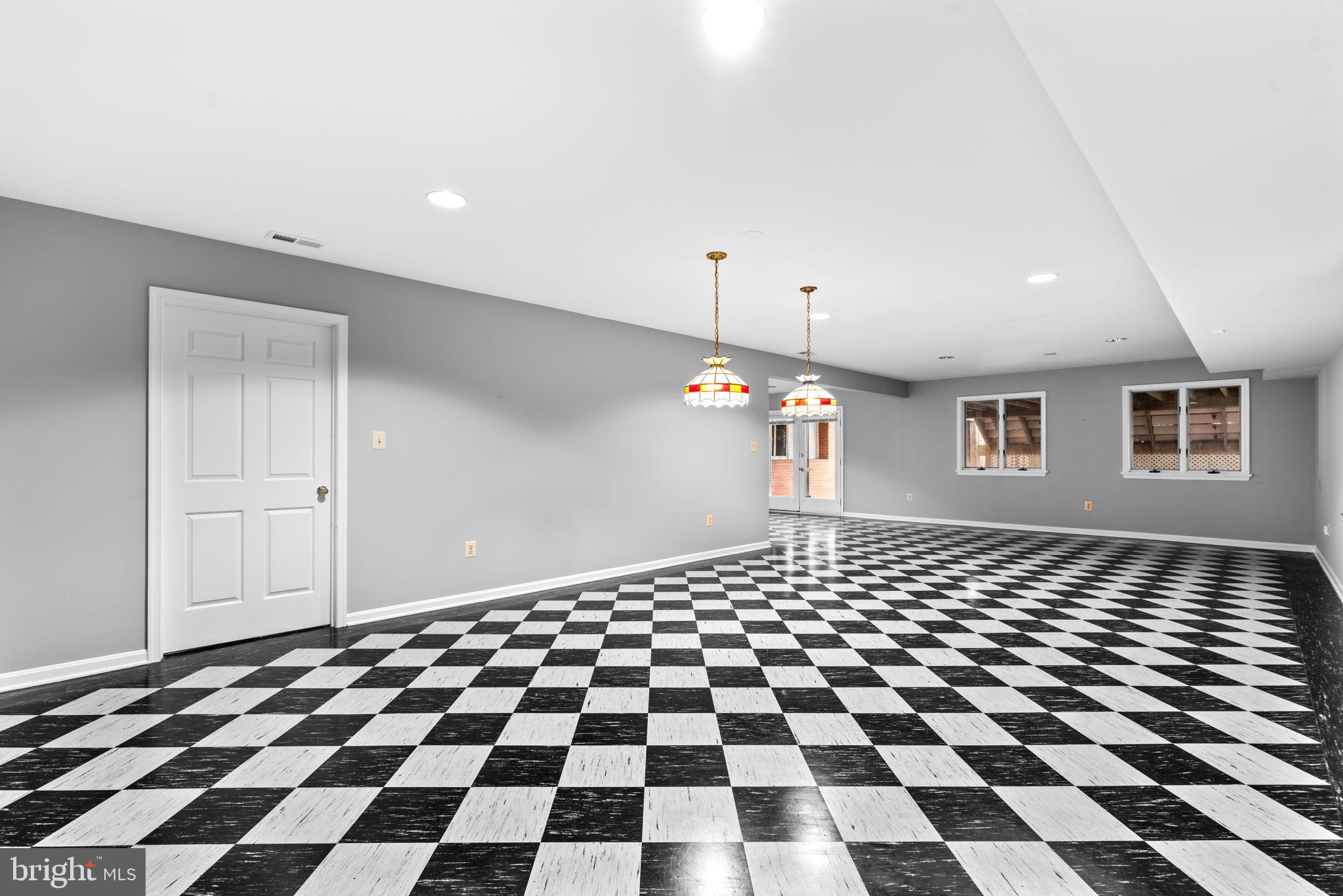 6005 Ten Oaks Road Clarksville, MD 21029 - Photo 81 of 86 a black and white checkered floor