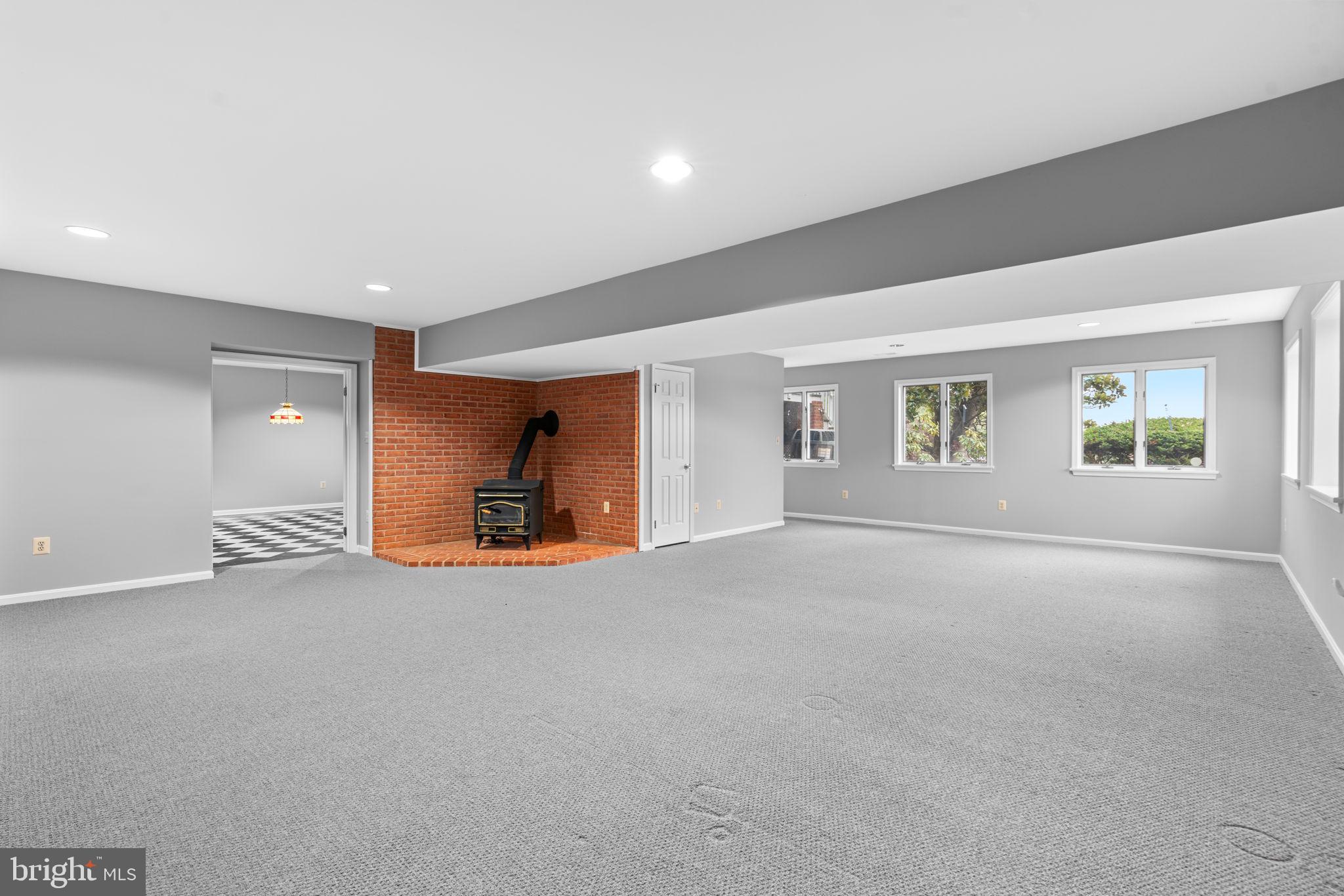 6005 Ten Oaks Road Clarksville, MD 21029 - Photo 83 of 86 a view of a big room with windows and cabinet