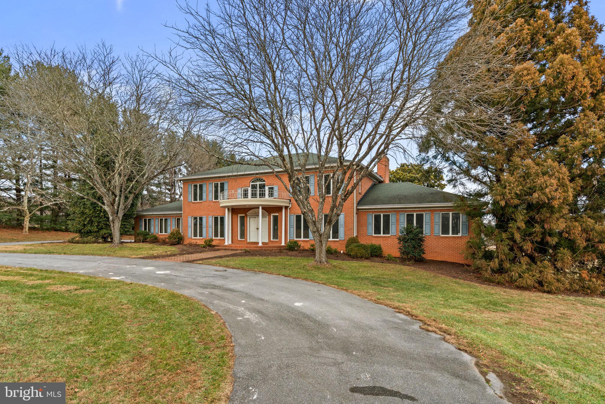 6005 Ten Oaks Road Clarksville, MD 21029 - Photo 86 of 86 front view of a house with a yard