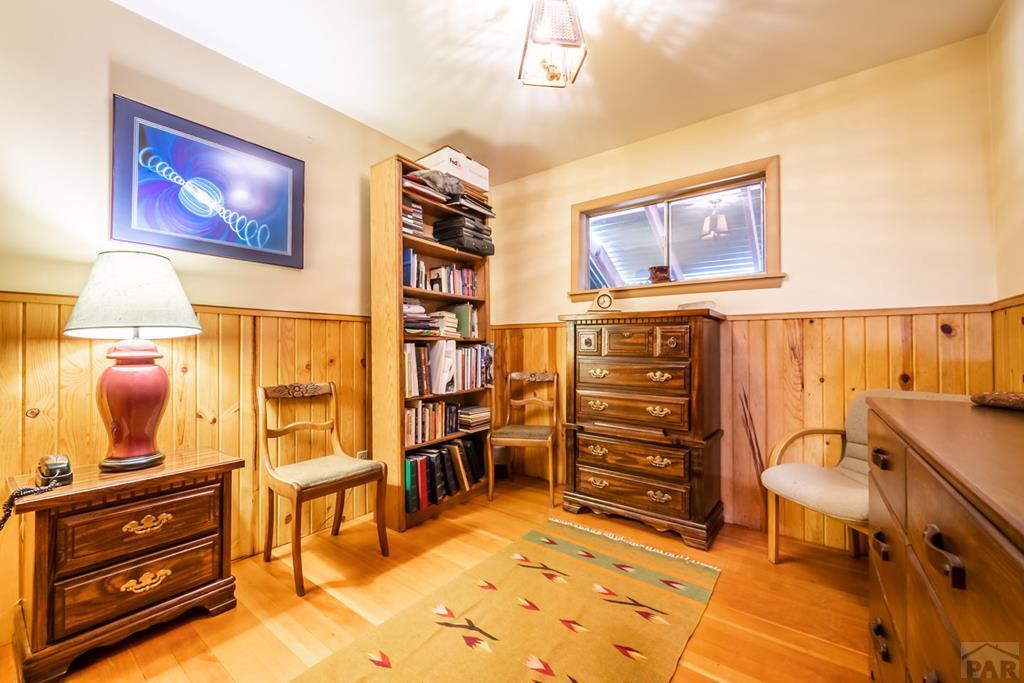 9600 Middle Creek Canyon Road Beulah, CO 81023 - Photo 29 of 50 a view of a livingroom with furniture and a window