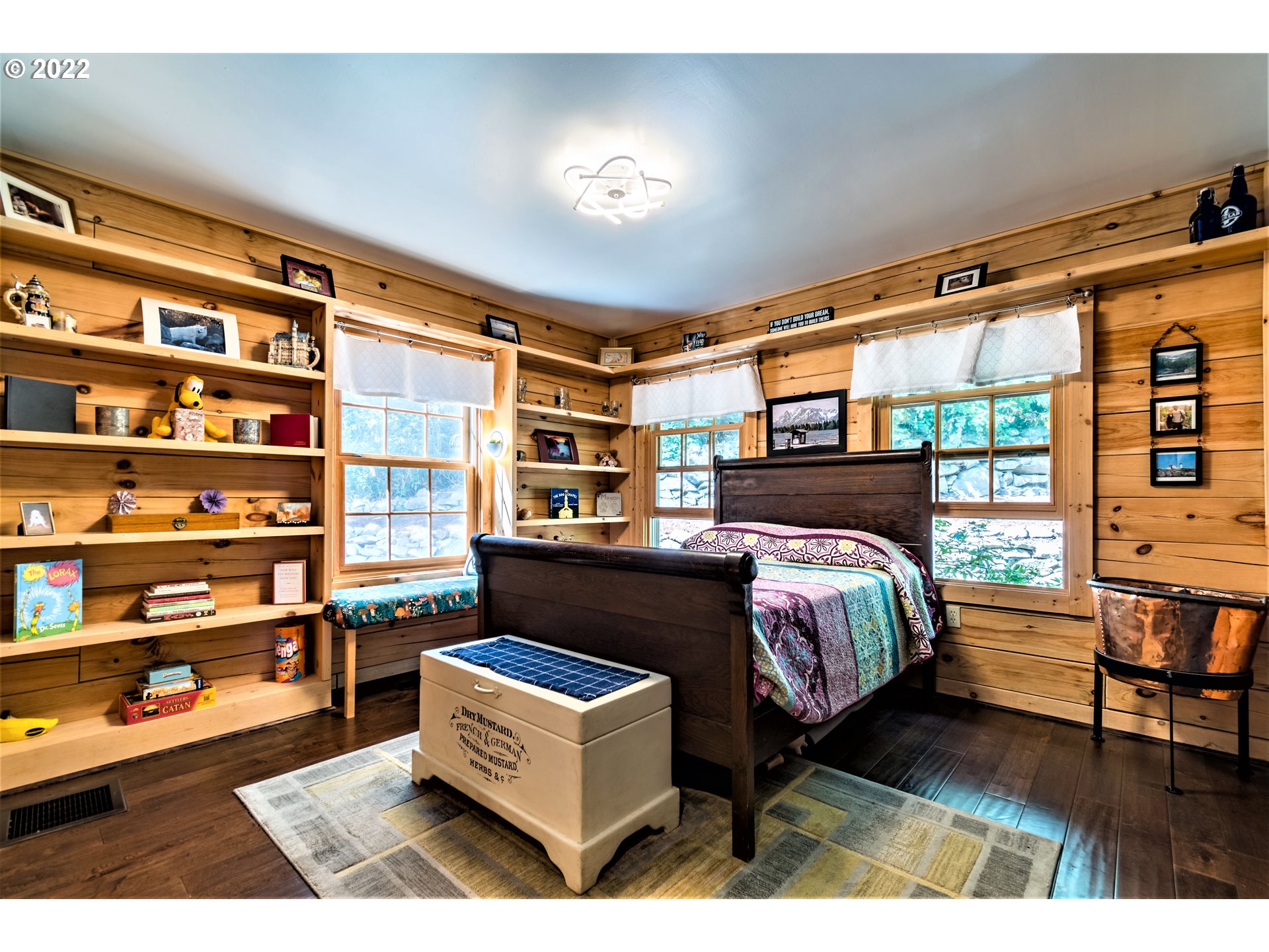 3330 Videra Drive Eugene, OR 97405 - Photo 11 of 32 a bedroom with furniture and a book shelf