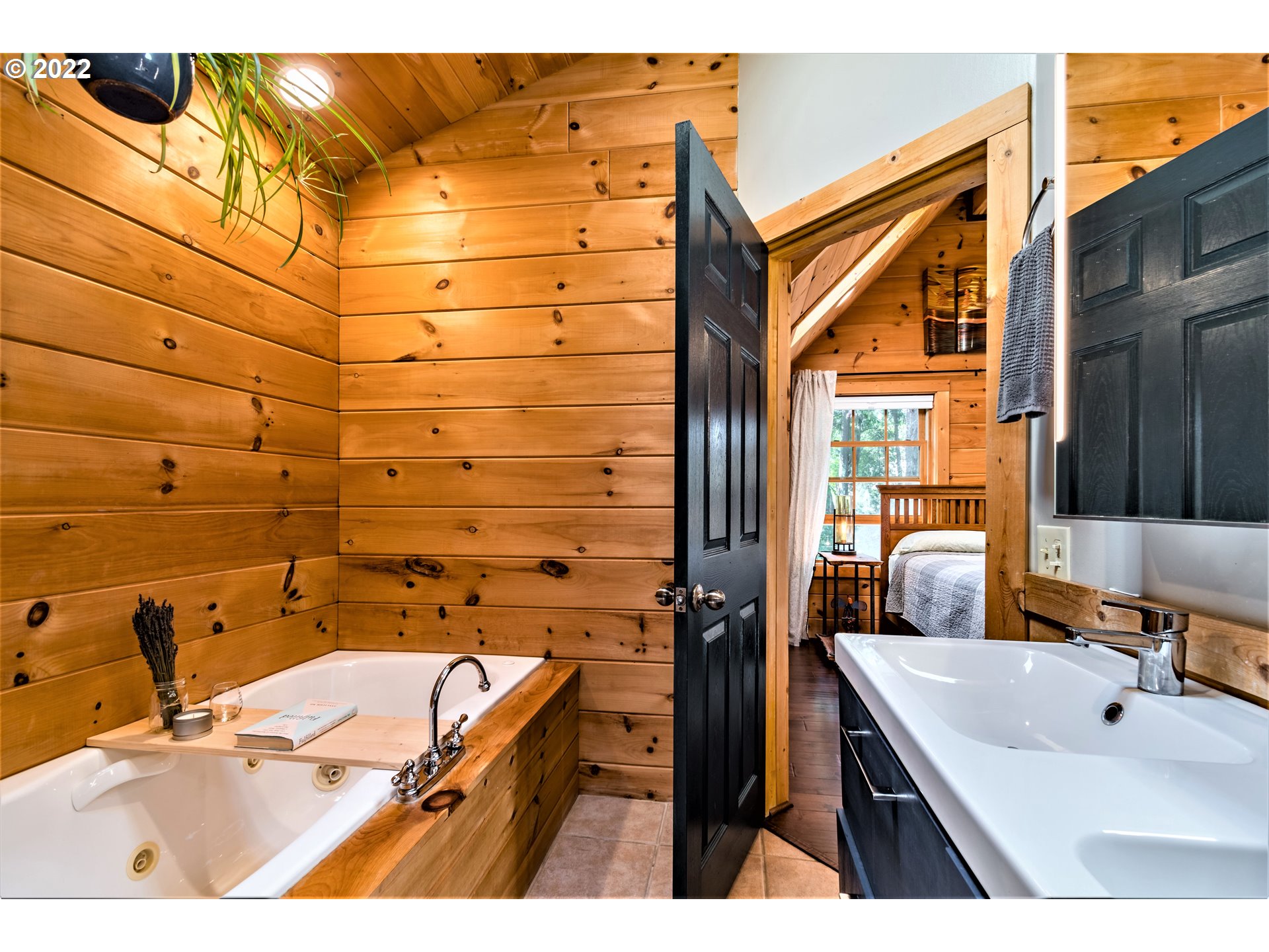 3330 Videra Drive Eugene, OR 97405 - Photo 21 of 32 a bathroom with a sink and mirror