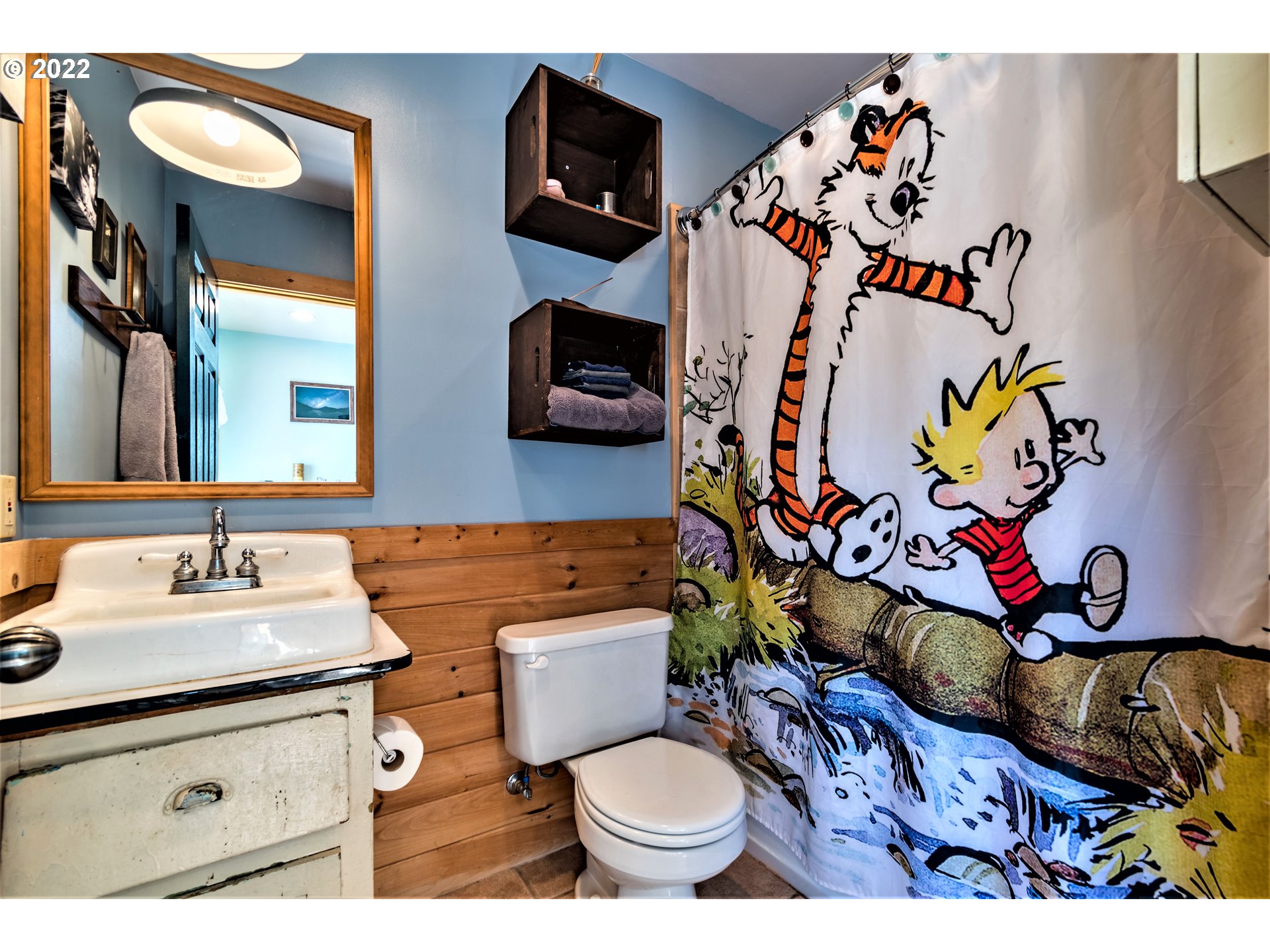 3330 Videra Drive Eugene, OR 97405 - Photo 27 of 32 a bathroom with a toilet sink and mirror