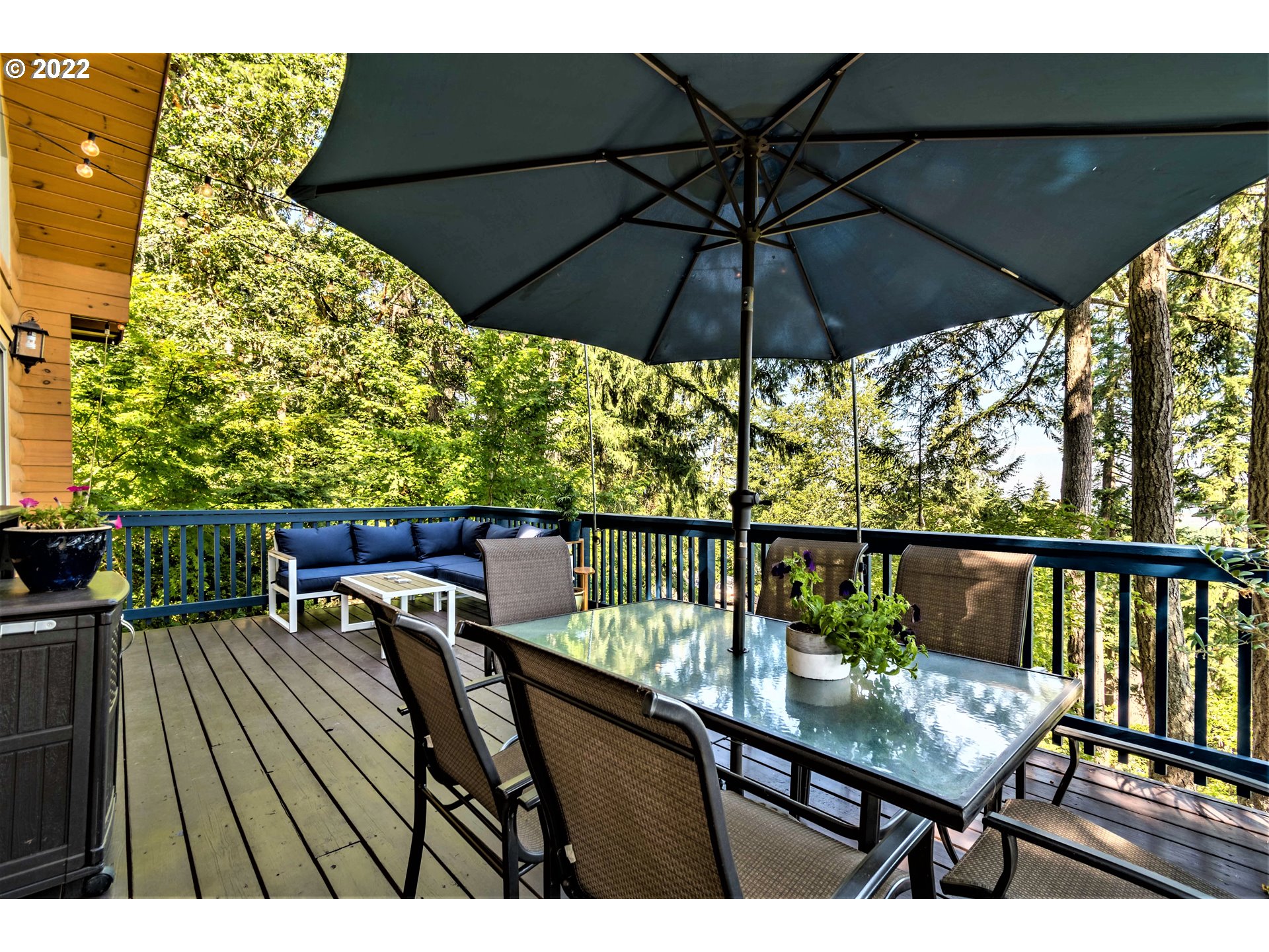 3330 Videra Drive Eugene, OR 97405 - Photo 31 of 32 a view of balcony with chairs and umbrella